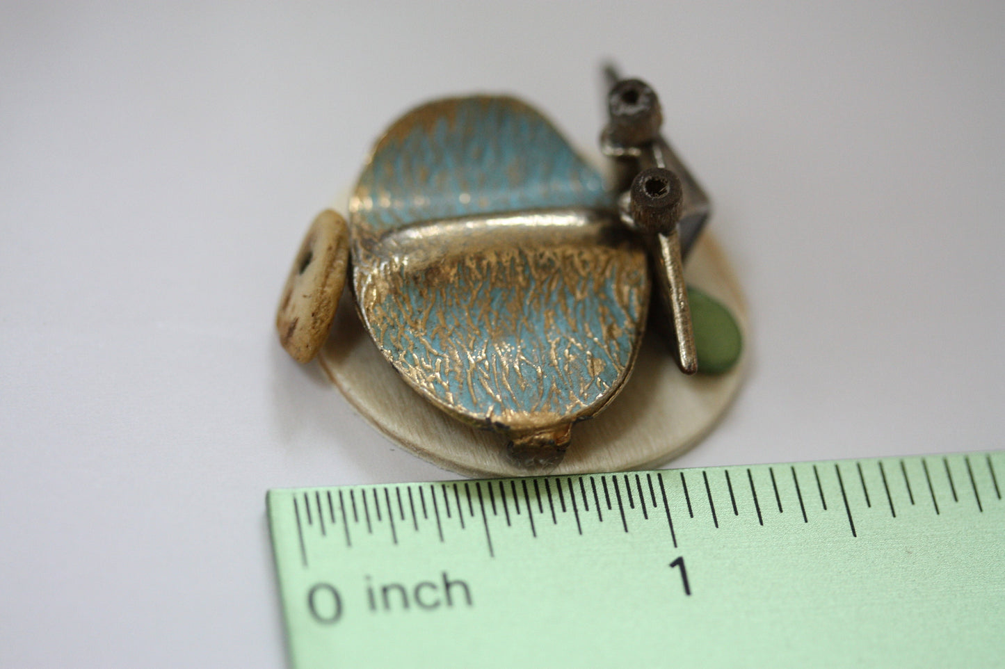 Handmade, one-of-a-kind assemblage art - can be ordered as a necklace, pin or magnet