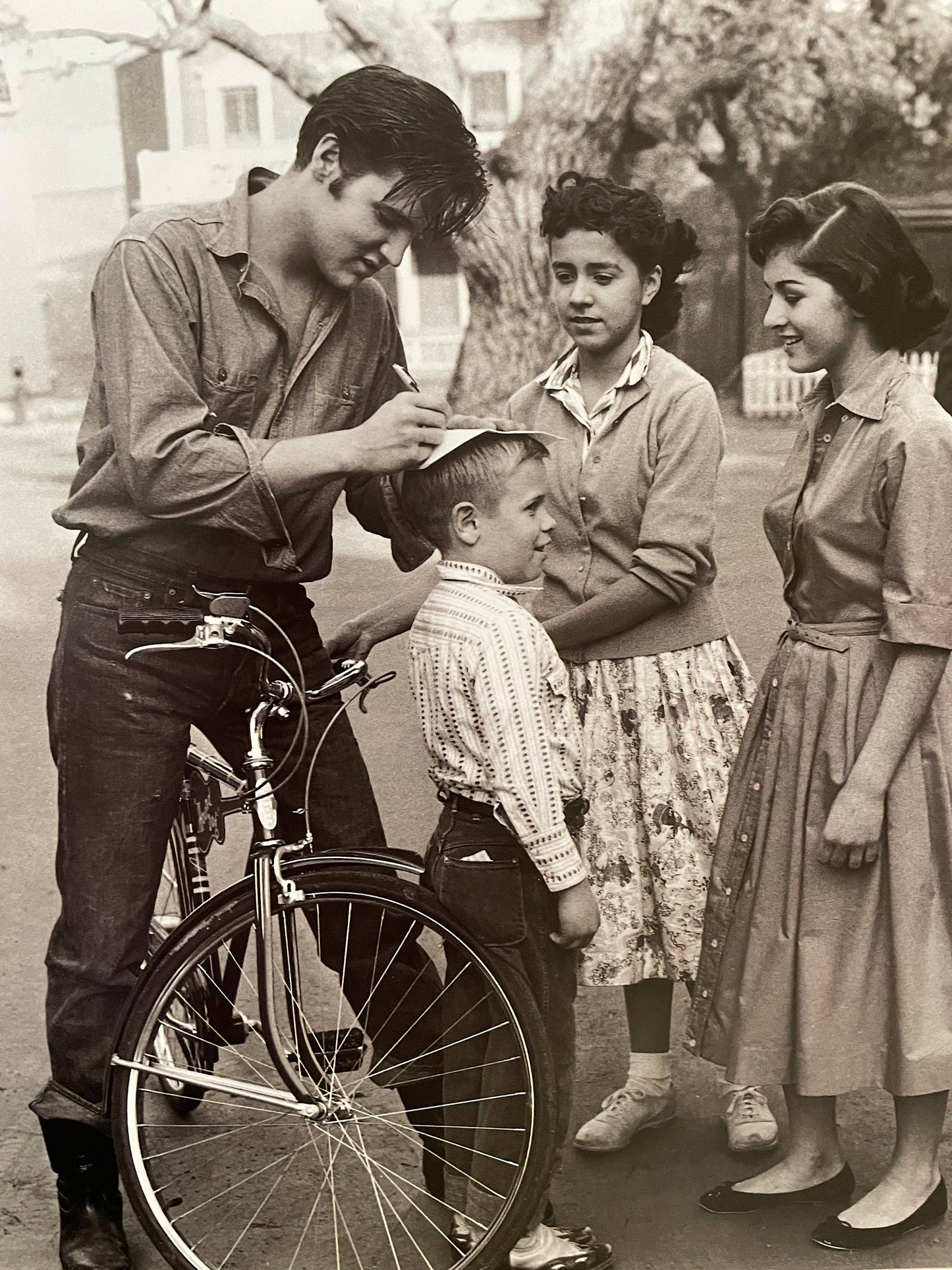 Legendary Rock 'N Roll - Elvis Presley signing autographs - print from vintage book - 12" x 10"