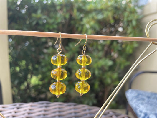 Yellow dangle sphere earrings