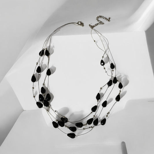 Multi strand black teardrop shaped vintage necklace