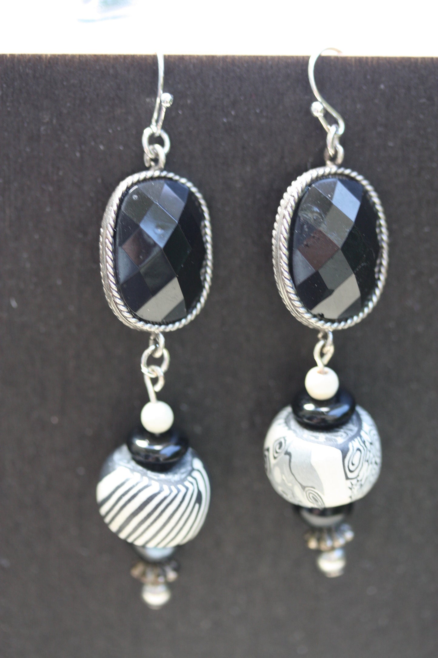 Black and white mixed media earrings made of upcycled polymer clay, combined with vintage black faux crystal, metal and glass spacer beads