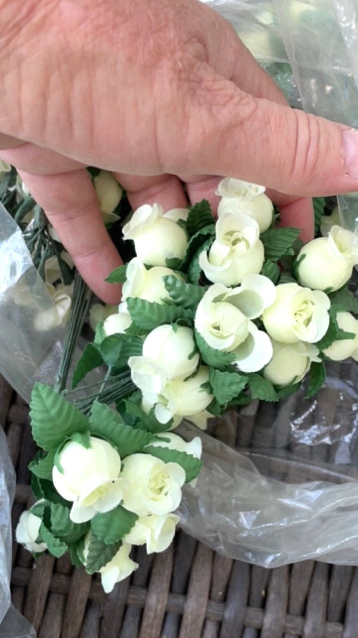 Three dozen (36) individually wire stemmed faux flowers - available in 3 colors - blue, yellow or white