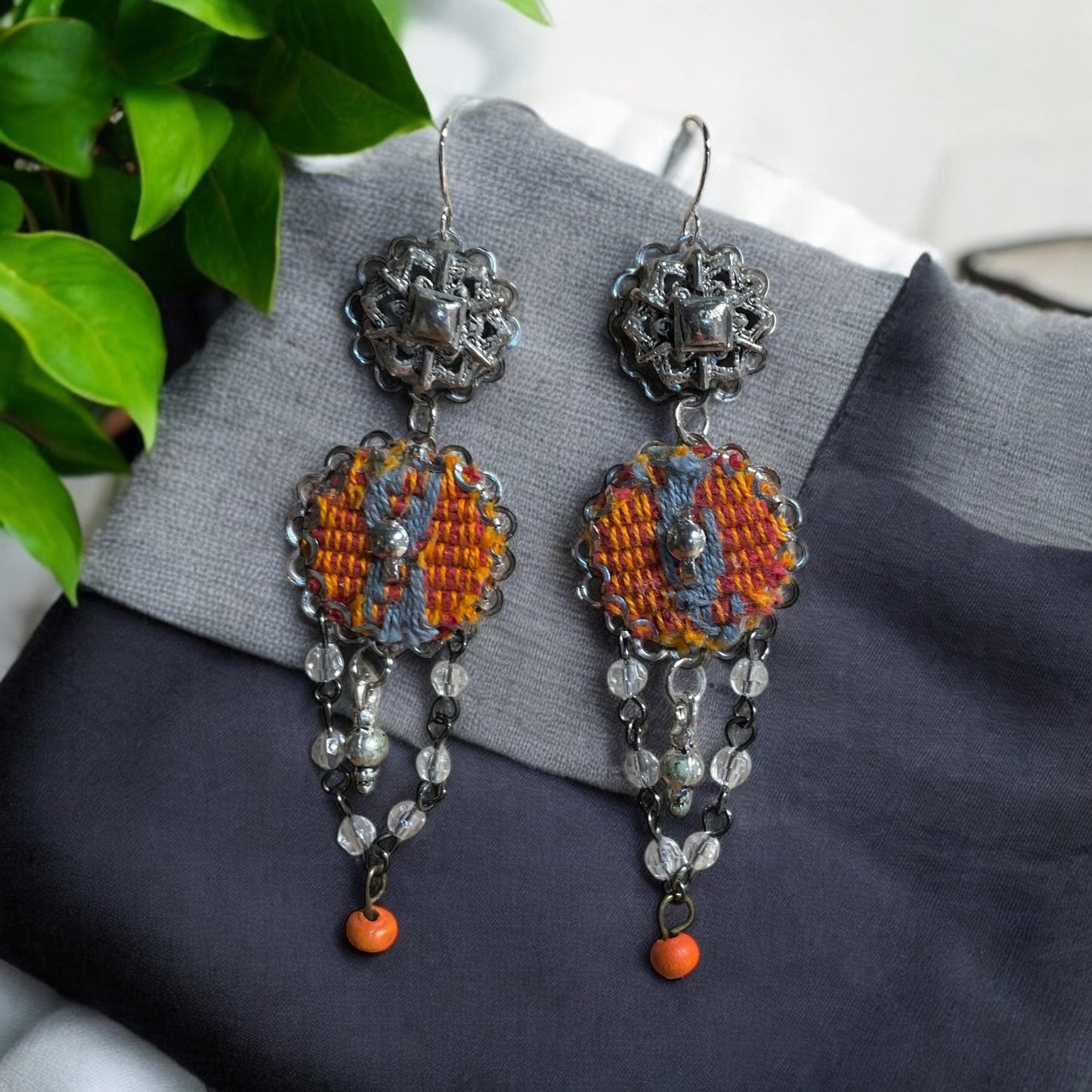Orange and gray mixed media collage earrings with mixed metals, fabric, crystal and wood; Sterling silver ear wires