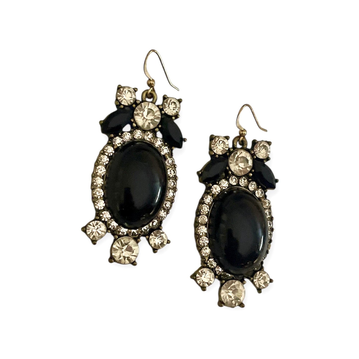 A pair of elegant black earrings adorned with sparkling rhinestones and a black oval-shaped stone.