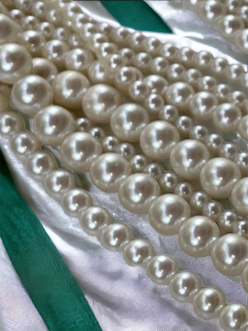 Stunning multi-stranded multi-sized all white faux pearl vintage necklace