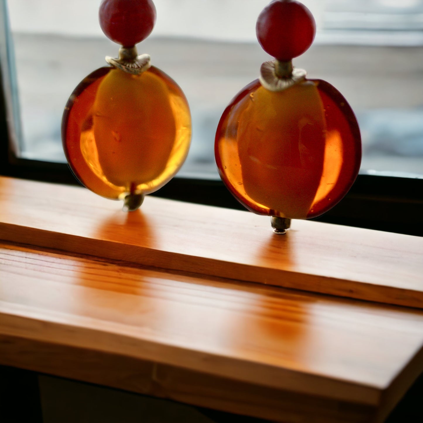 Orange and deep red dangle earrings
