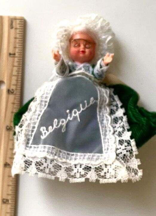 Stunning vintage collectible art baby Doll from Belgium with green velvet dress and lace overlay