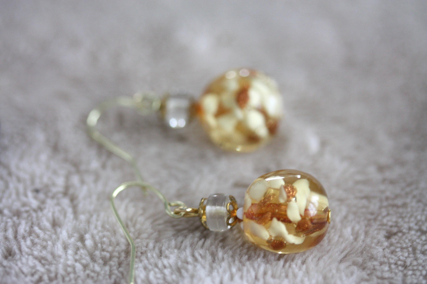 Stunning yellow and gold blown glass earrings with goldstone filigree - 1 and 1/4"