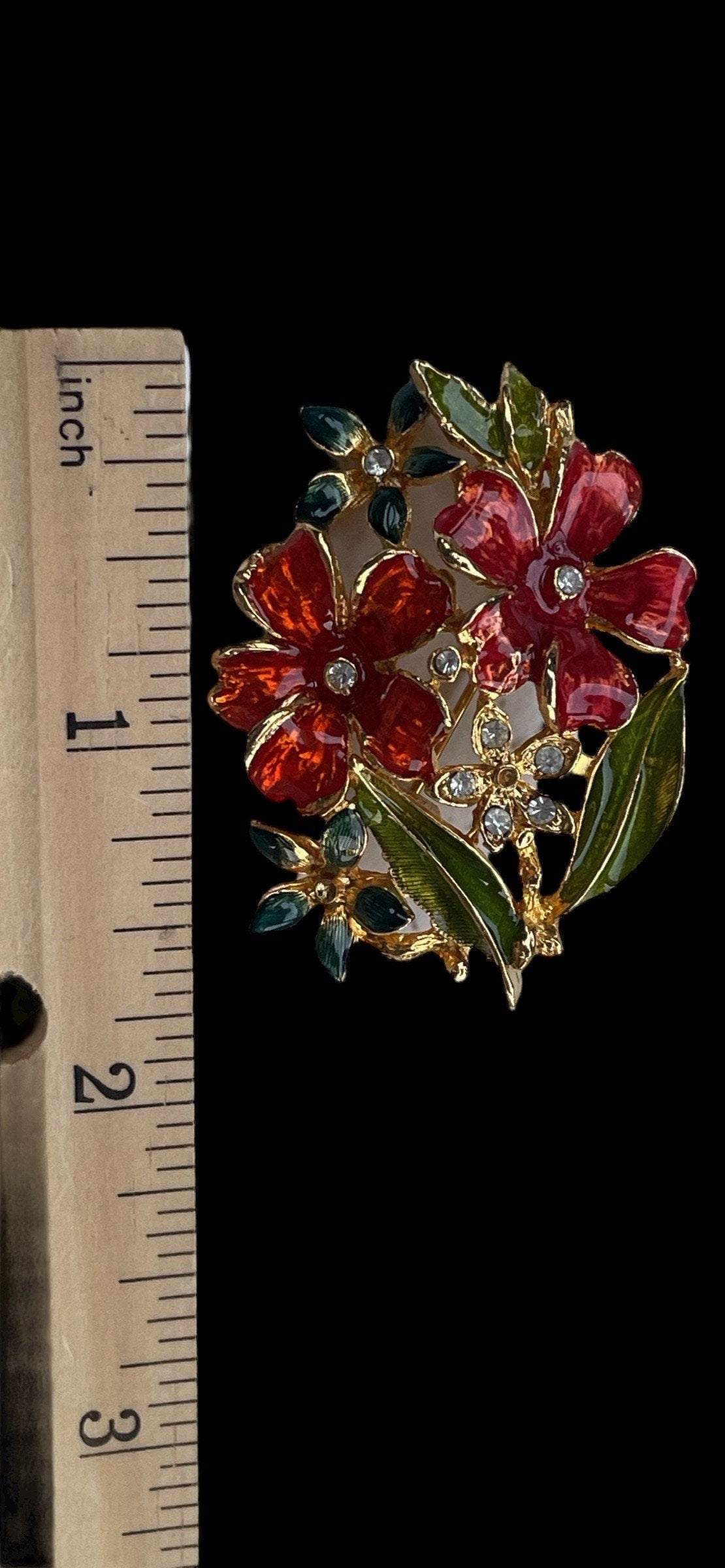 Stunning enamel floral pin with rhinestones