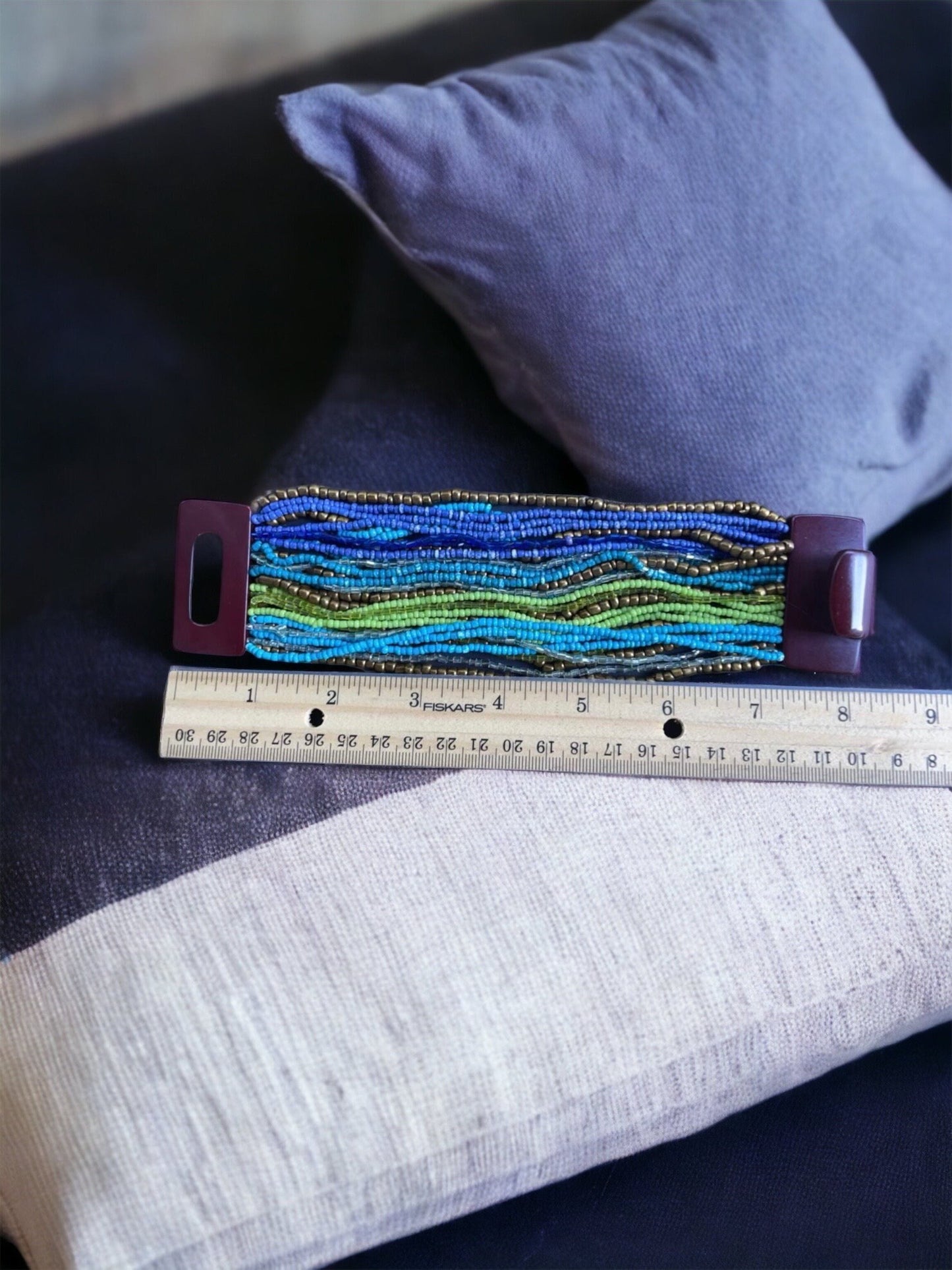 Stunning vintage bracelet - loaded with dozens of strands of tiny glass beads - plastic or bakelite closure?