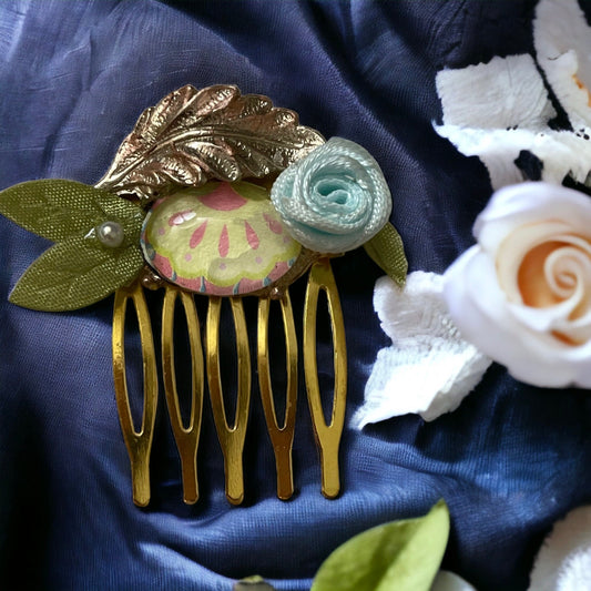 Garden inspired mixed material small 1" hair comb with antiqued metal leaf, paper sealed glass cabochon, satin flower/leaves