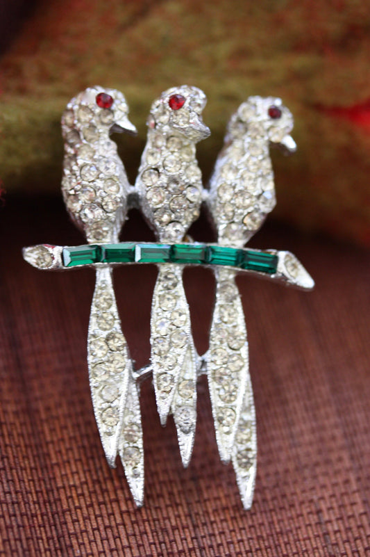 Stunning vintage pin - 3 rhinestone studded birds on a green crystal baguette branch