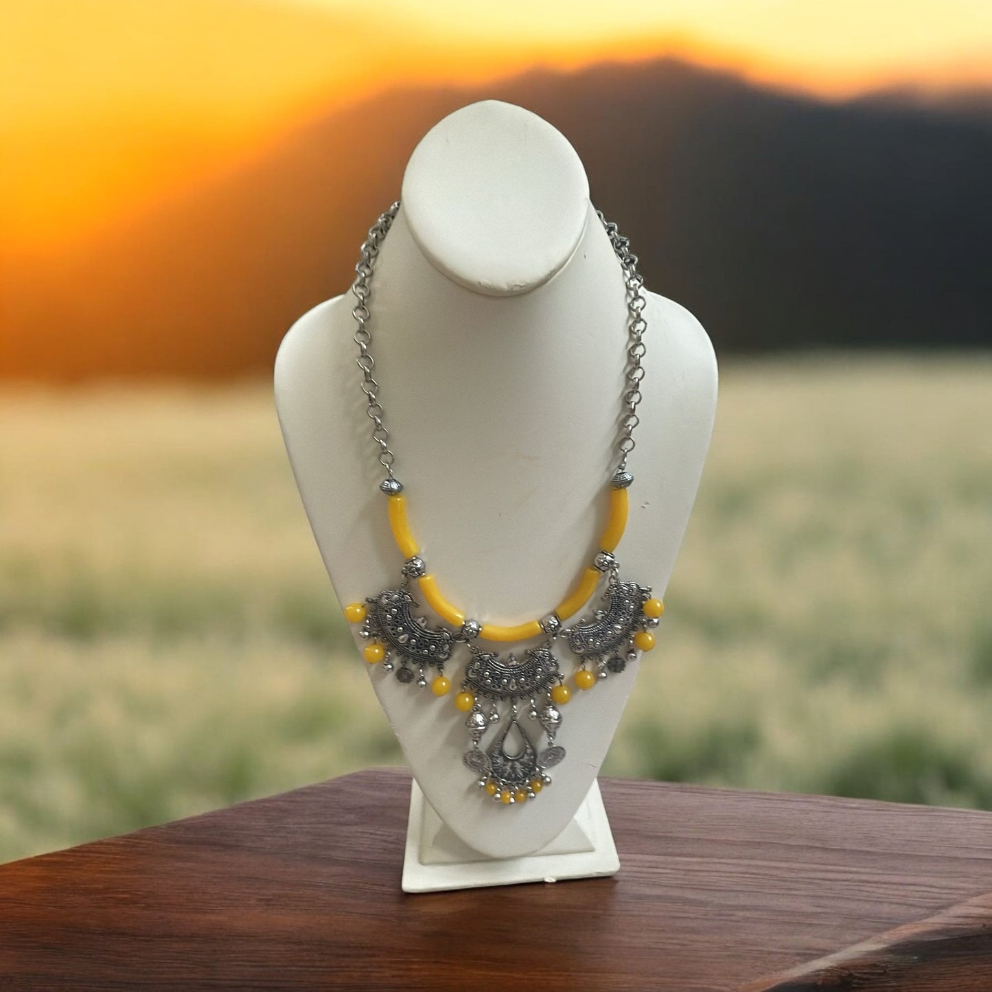 Exotic Indian style necklace with yellow beaded balls/tubes and ornate silver trim
