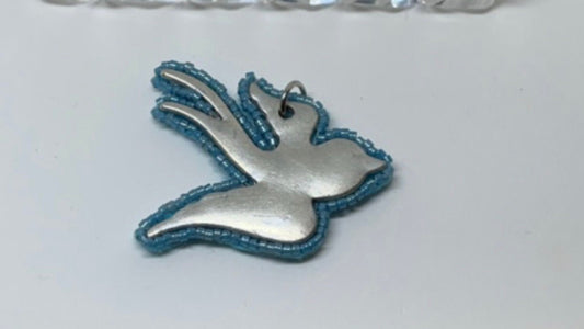 Blue beaded dove necklace pendant