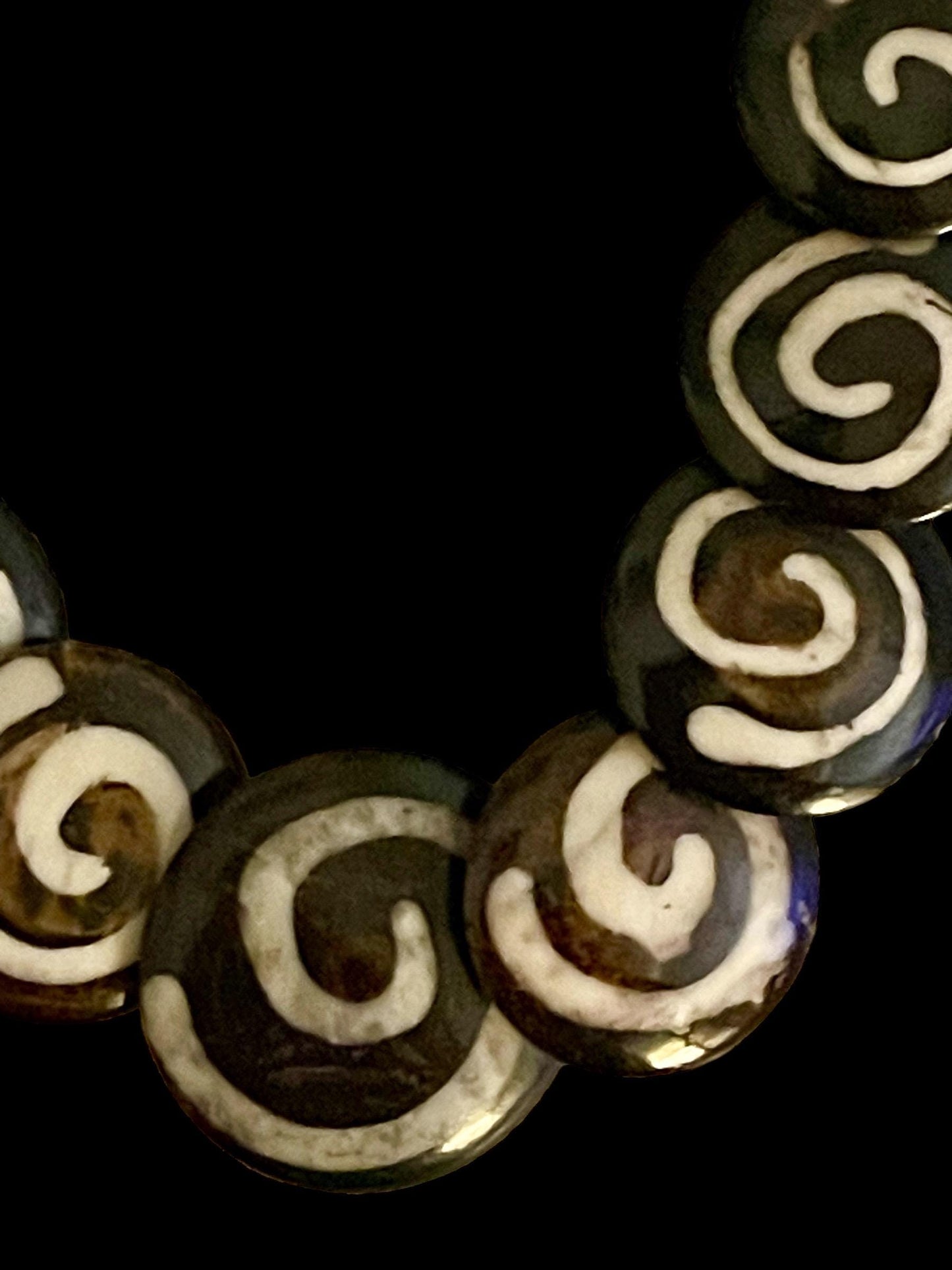 Tribal style vintage necklace - with beautiful swirled discs that are either bovine or wood?