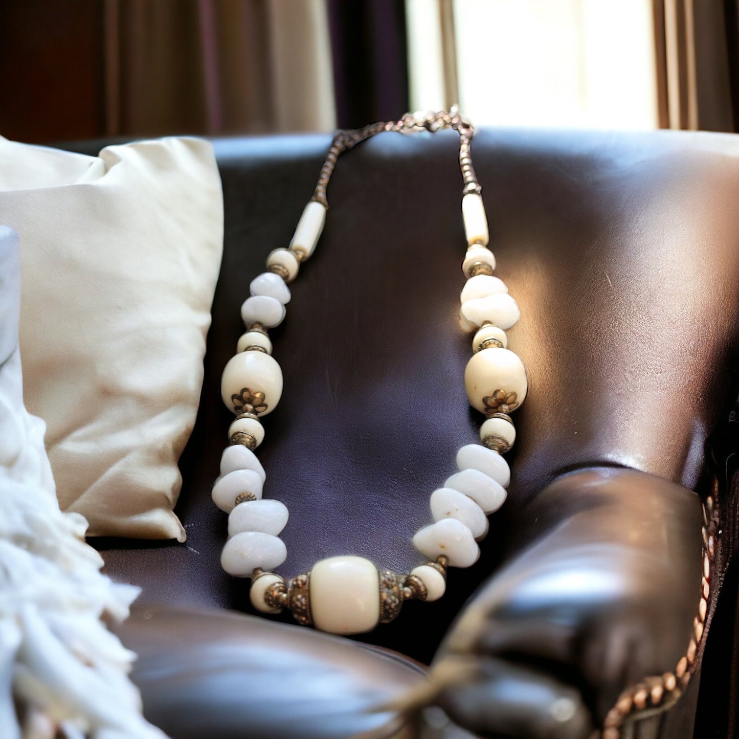 Unique vintage necklace - drilled stones, metal spacers and horn style varied shaped beads