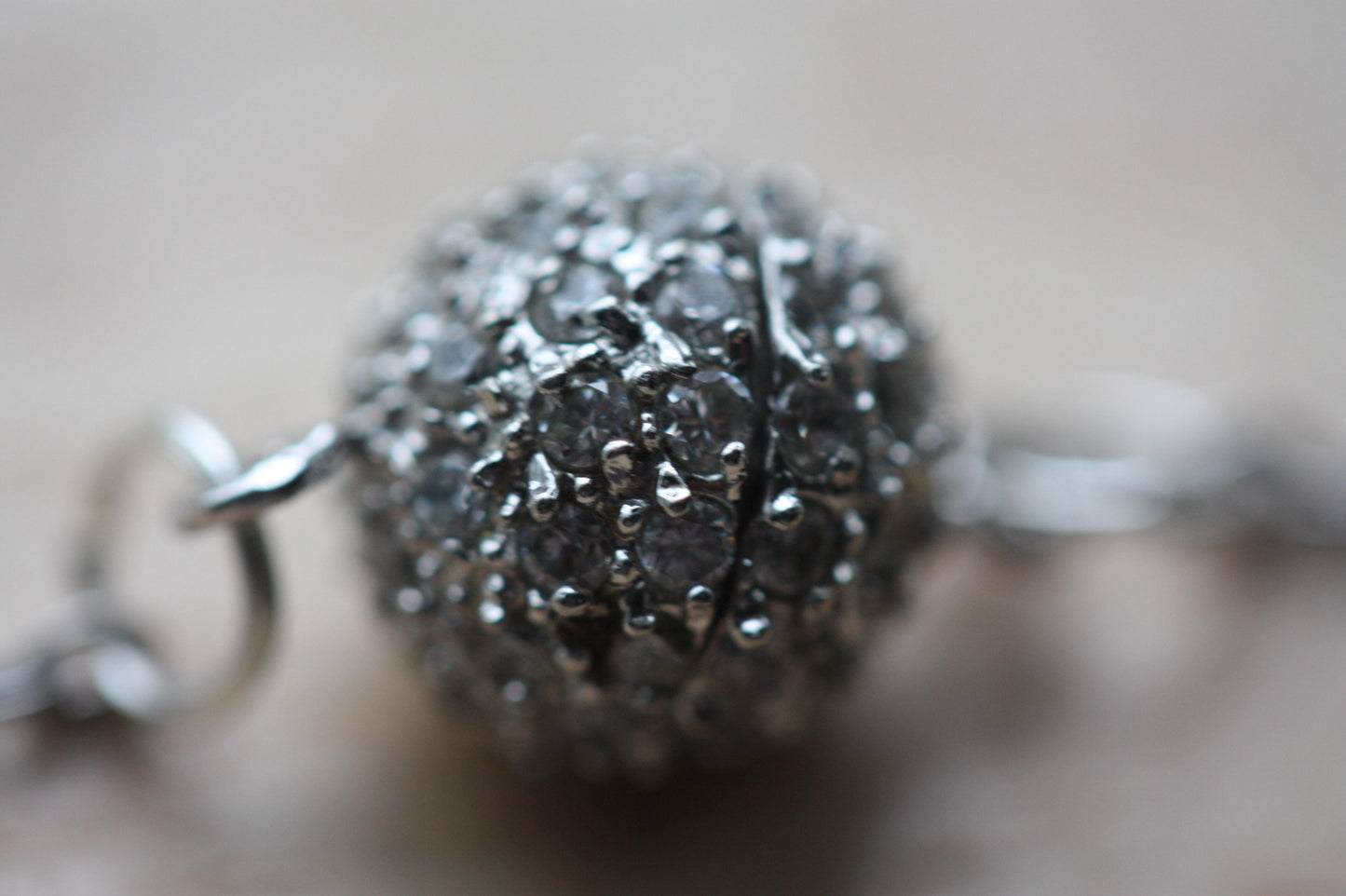 Handmade bracelet made with unique round marcasite ball that is the focal point and also unwinds as the clasp