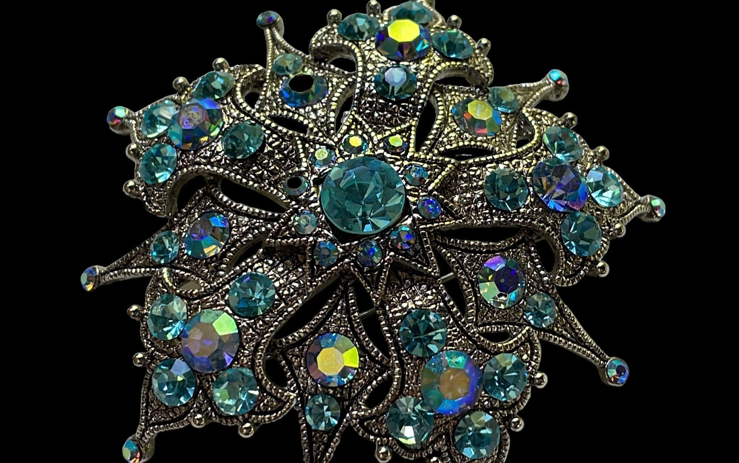 Magnificent vintage pin loaded with blue AB rhinestones