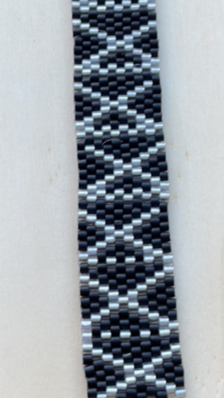 Stunning vintage silver and black hand woven vintage beadwork bracelet