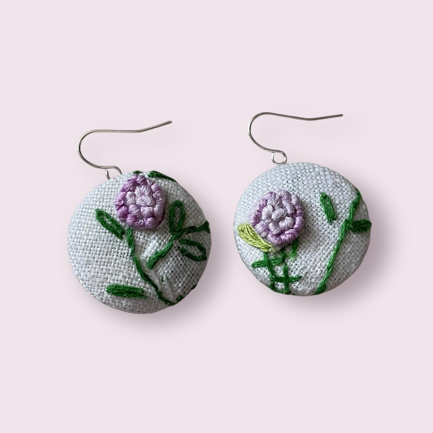 Choice of stud earrings, dangle earrings, hair combs, shanked buttons or pins all hand made from a vintage linen embroidered table runner