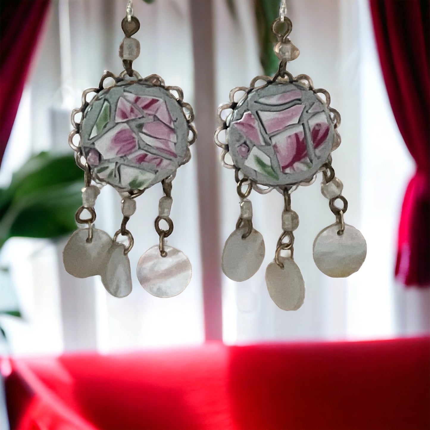 Unique earrings made of hand cut mosaic tile from vintage plates combined with mother of pearl dangles