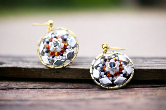 Orange and navy blue intricate beadwork small circular dangle earrings