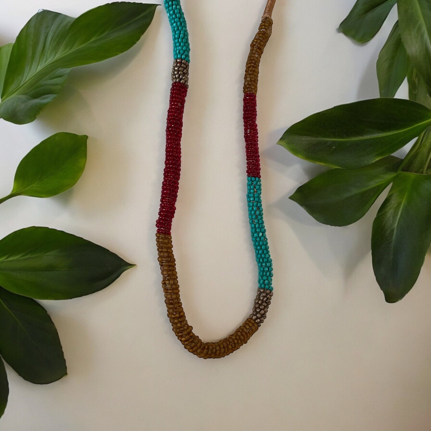 Stunning silk wrapped earth tone beaded long vintage necklace