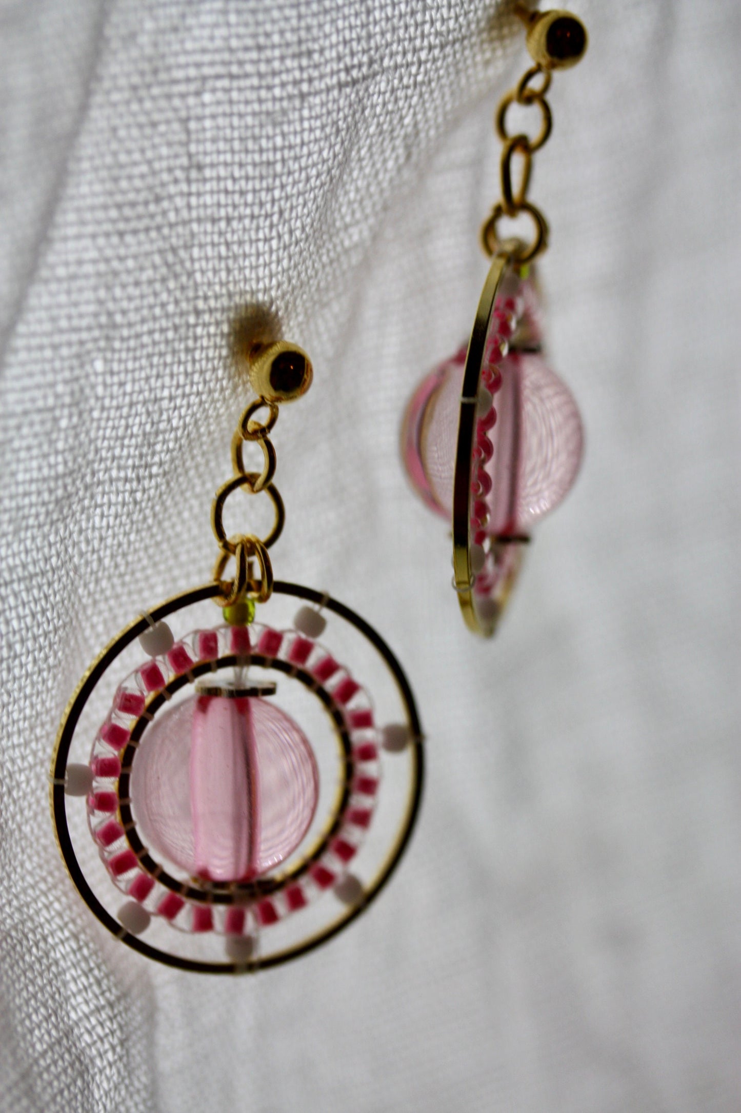 Pink and white intricate beadwork small circular dangle earrings