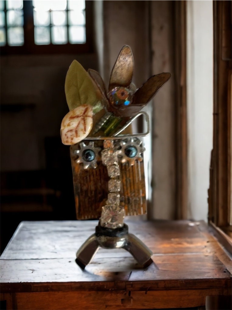 Meet "Gert" a mixed material piece made of parts of a vintage Swiss music box, along with hardware - pin or necklace pendant