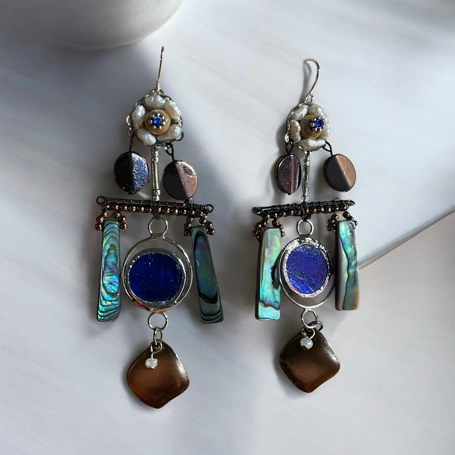Abalone mixed media collage earrings with mixed metals and findings, pearls, wood, beadwork and abalone shells; Sterling silver ear wires