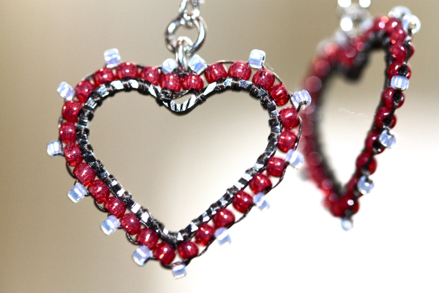 Small intricately beaded heart dangle earrings - original beadwork