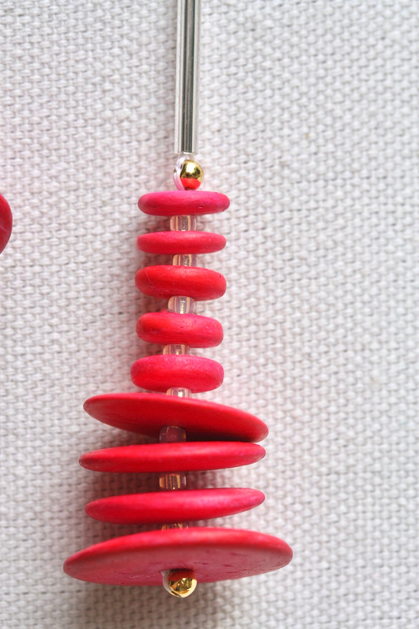 Unique, hand beaded reddish pink wood heishi beads - fun statement earrings