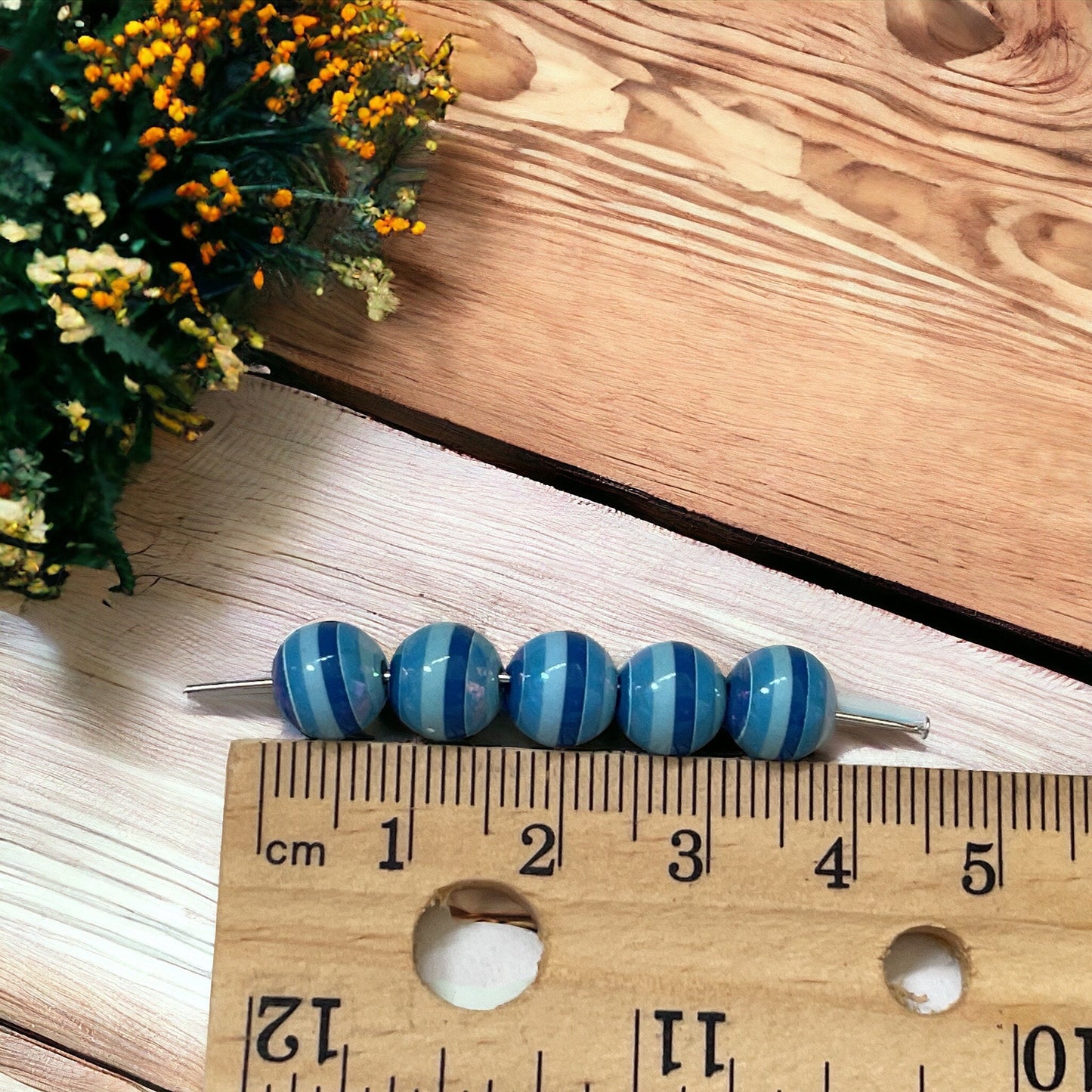 One dozen striped shades of blue vintage beads - approx. 6 mm each