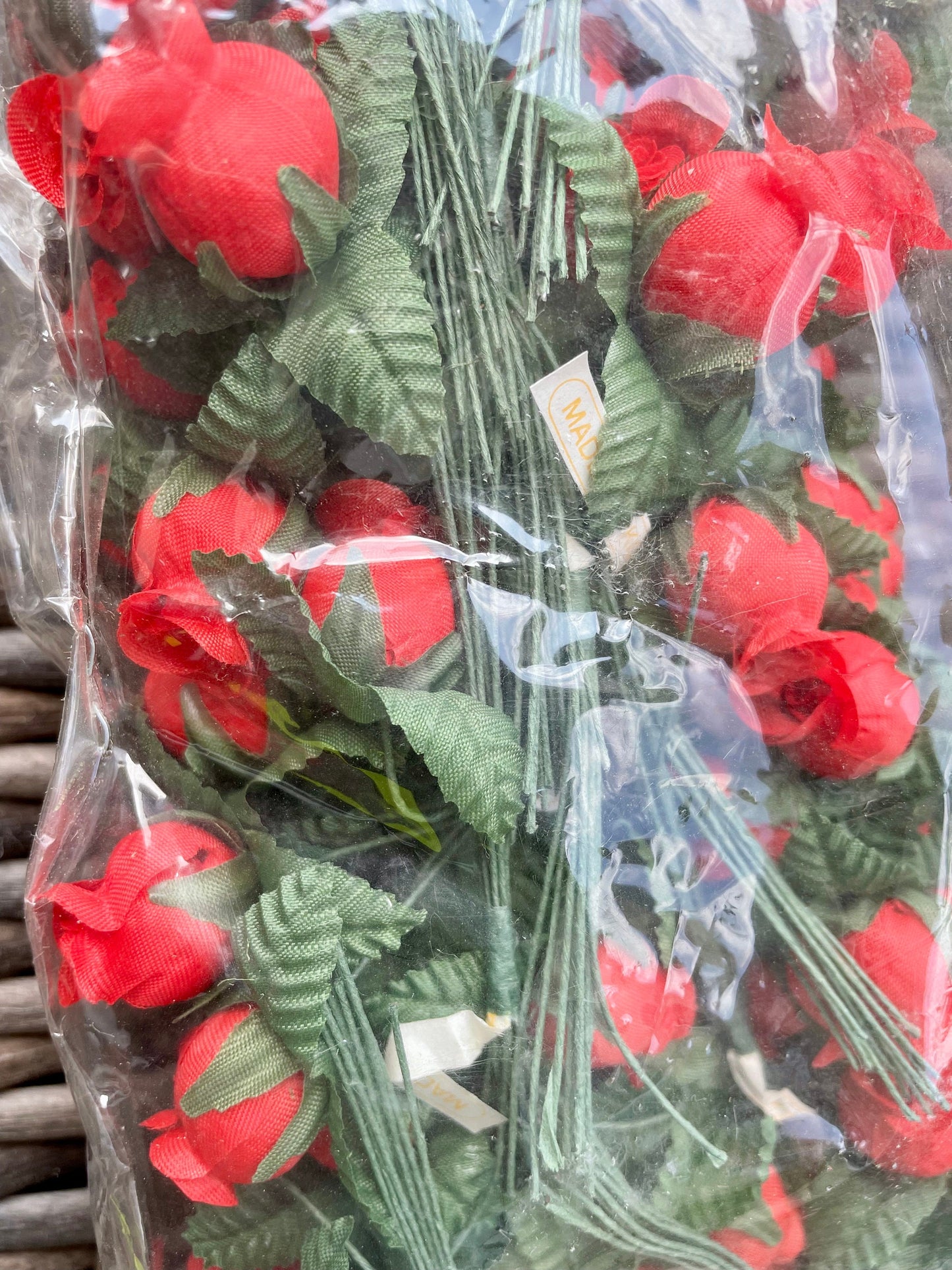 Three dozen red faux flowers - wire stemmed red flowers