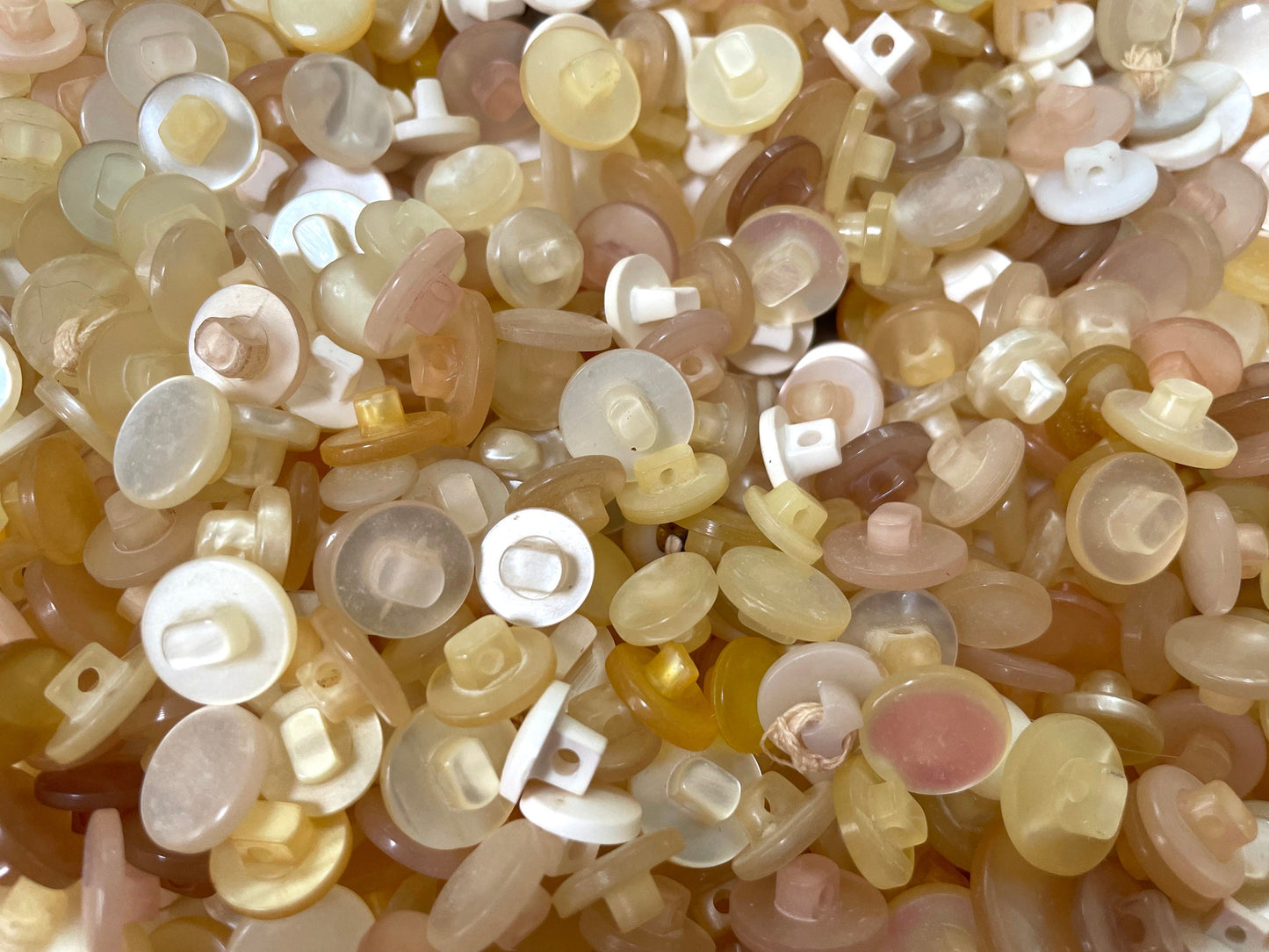Light toned pearl finish grab bag mix of vintage buttons
