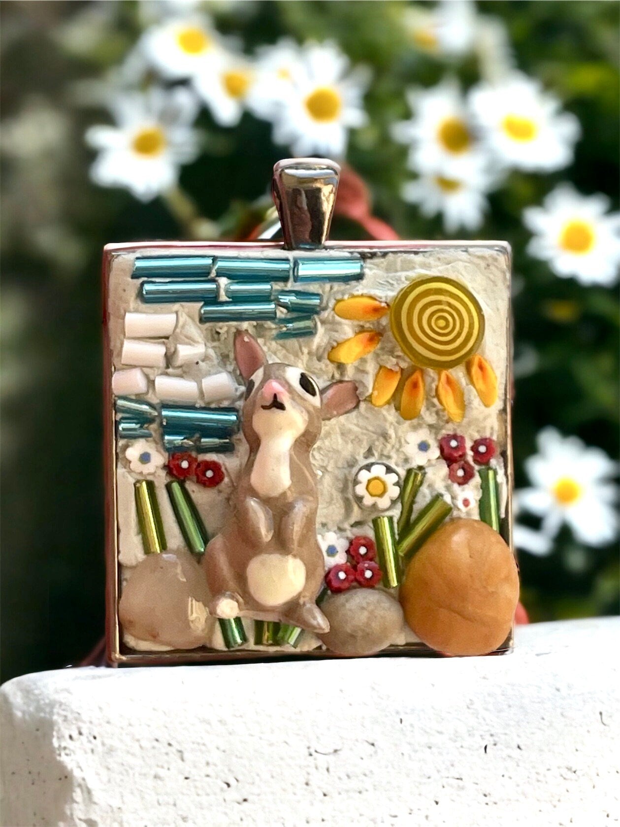 Handmade mixed material micro mosaic necklace - bone china rabbit sitting in sunshine with flowers, grass and rocks (from the Jersey shore)