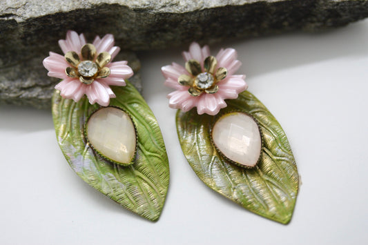 Hand painted leaf earrings with inlaid cabochan, vintage mixed material pink and metal flowers and capped off with rhinestone center