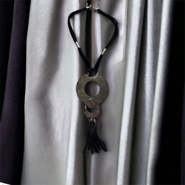 Unique vintage necklace with black suede and silvertone metal