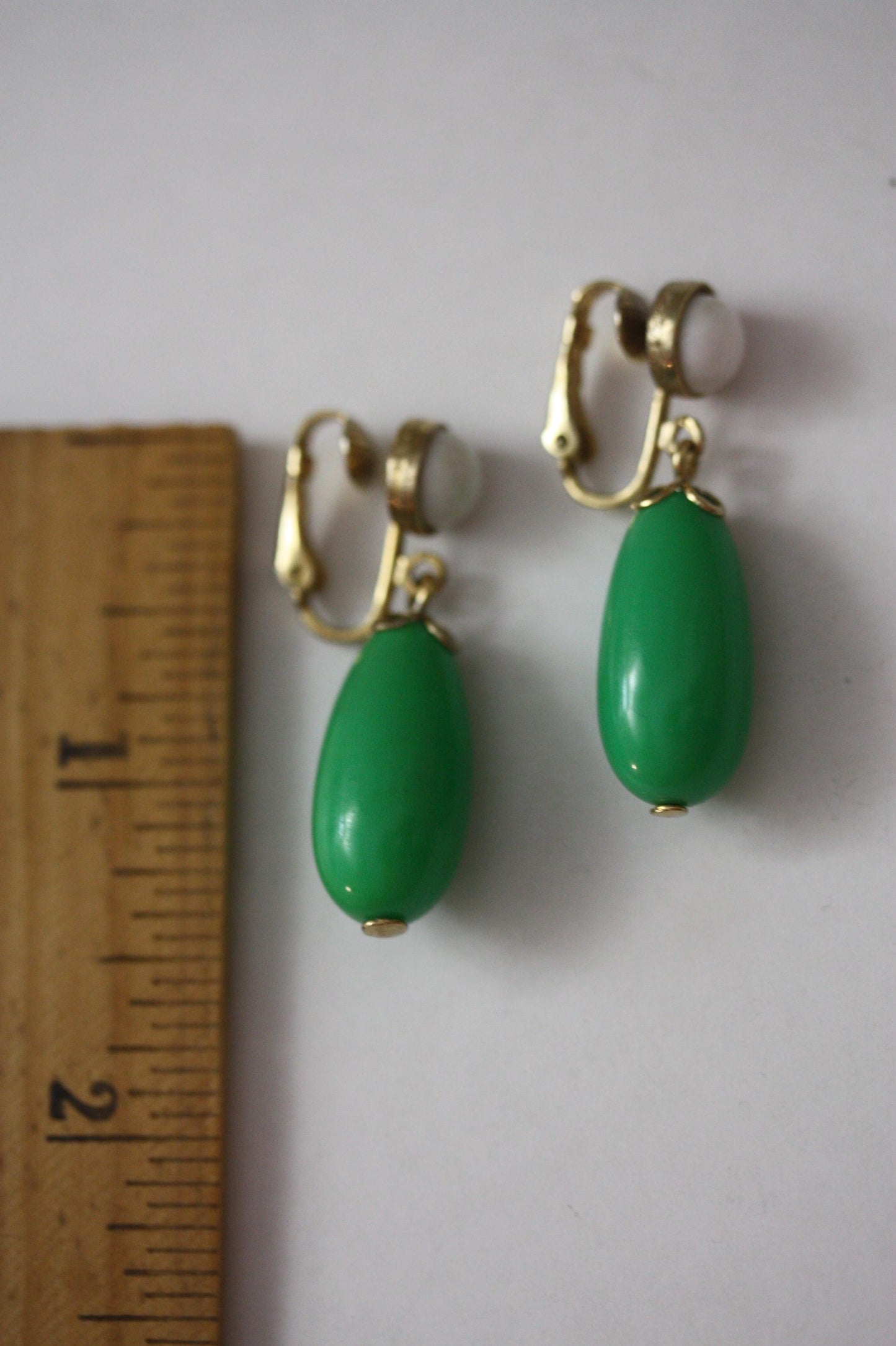 Green and white vintage Avon clip on dangle earrings