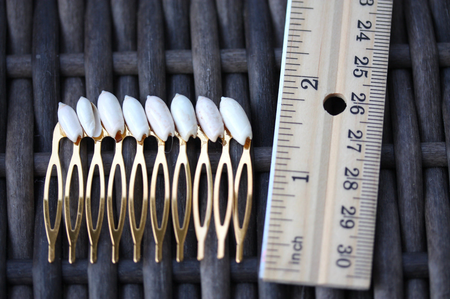 Stunning goldtone hair comb with white shells
