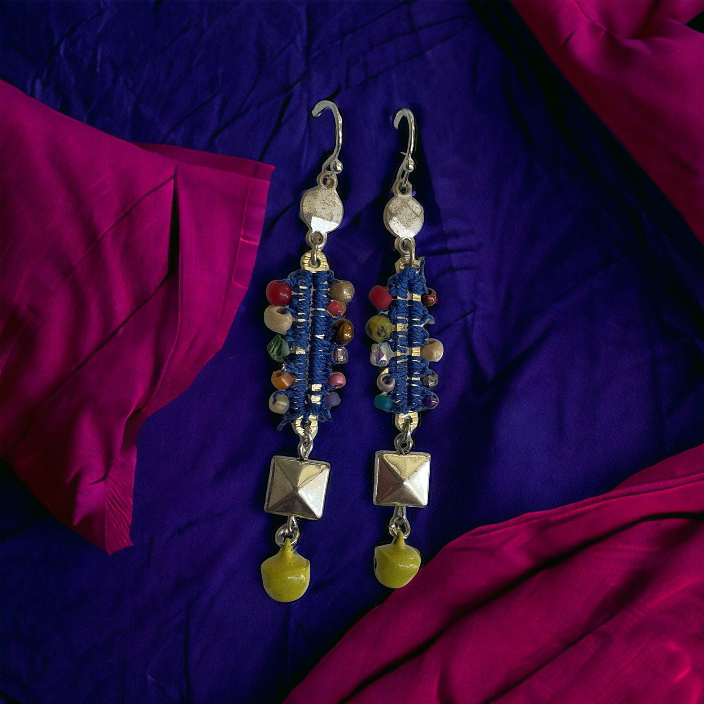 Mixed material collage earrings - metal, string, glass, and mustard yellow tiny bells