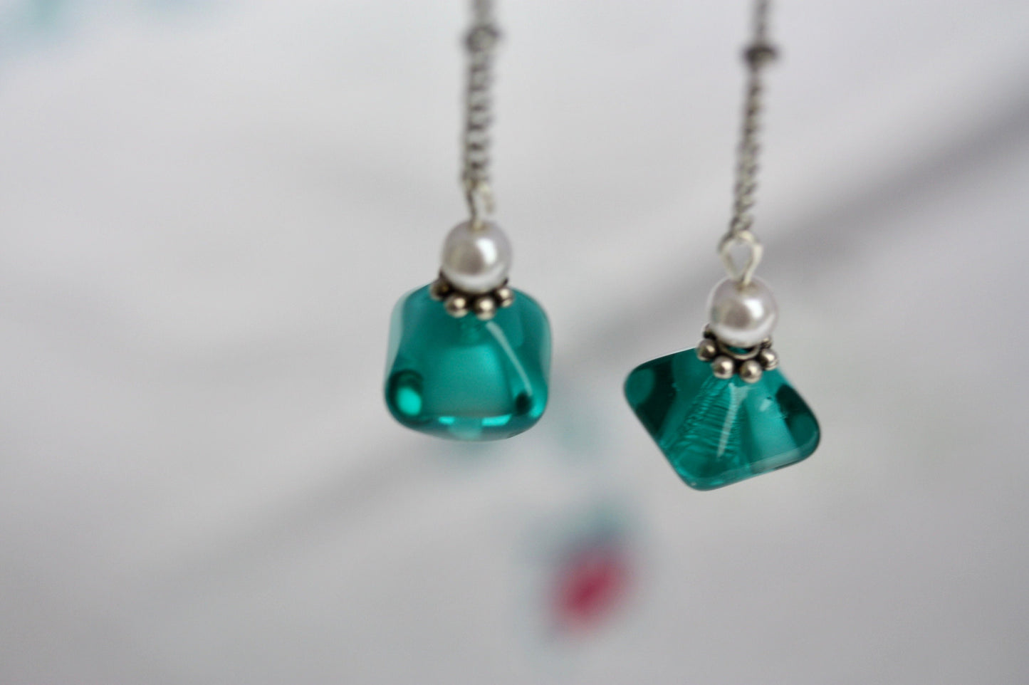 Long mixed material silver chain earrings with silver bars, faux baby pearls and triangular turquoise glass