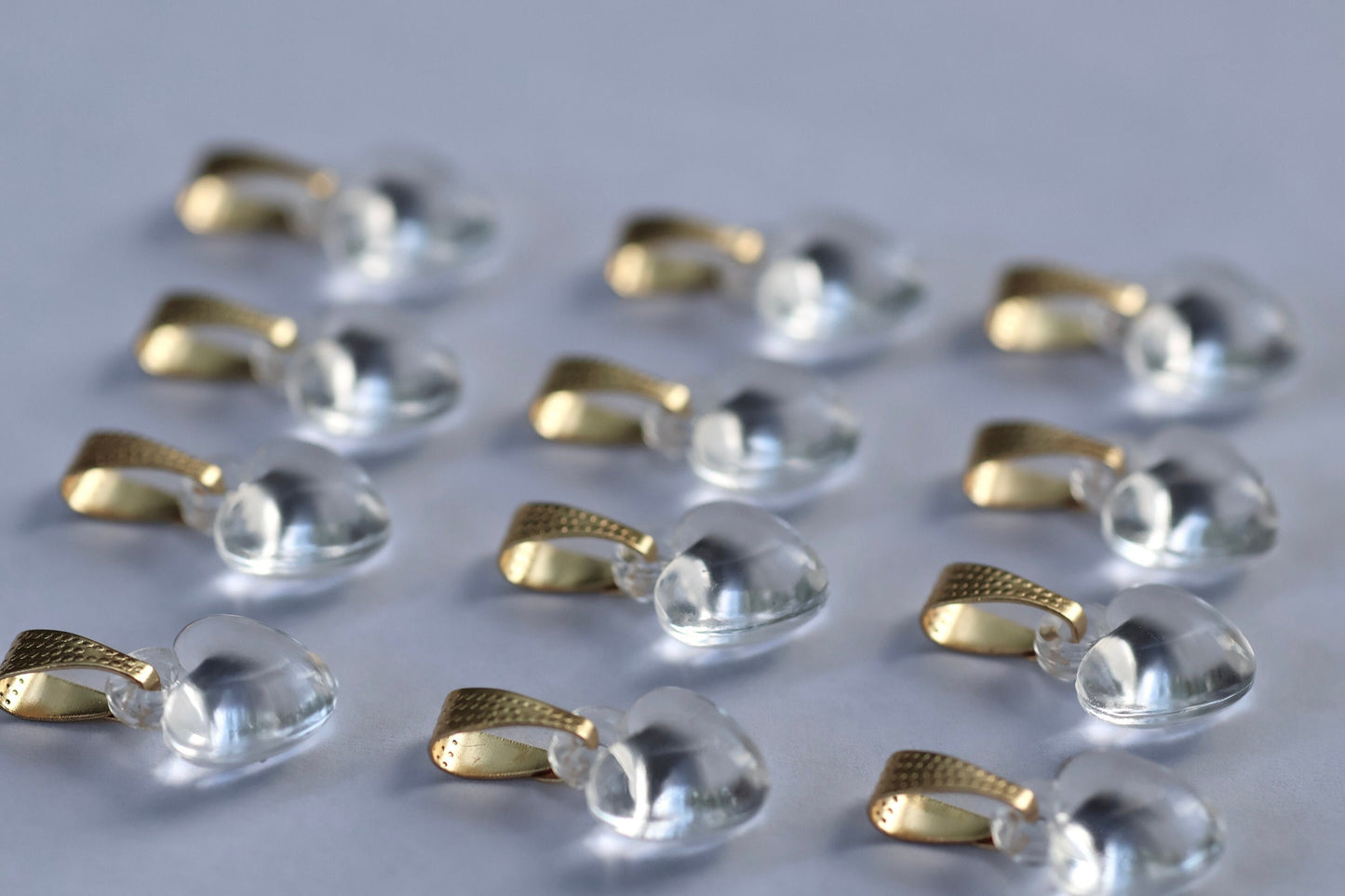 One dozen clear heart pendants - can be used as necklace pendants or for making earrings