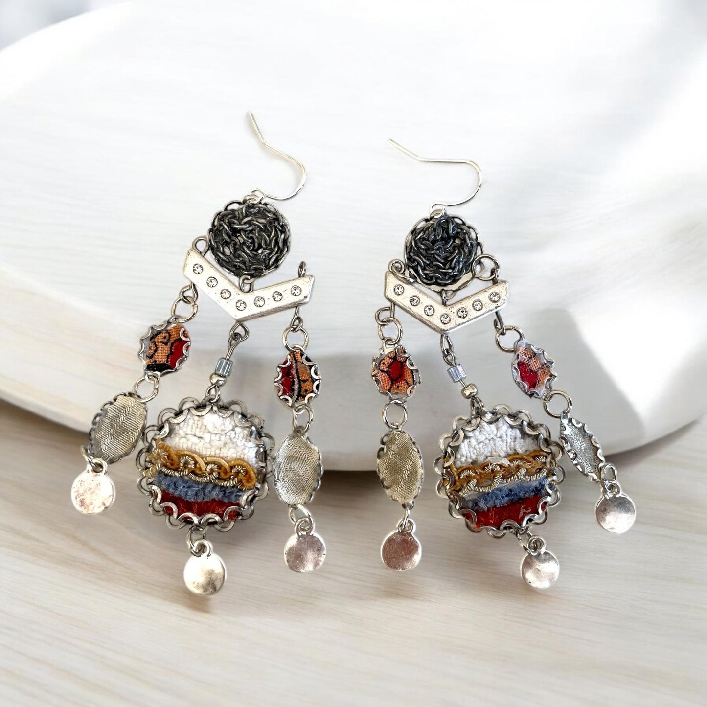 One-of-a-kind earrings made with fabric, velvet, lace, mixed metals, chain and rhinestone studded spacers. Sterling ear wires.