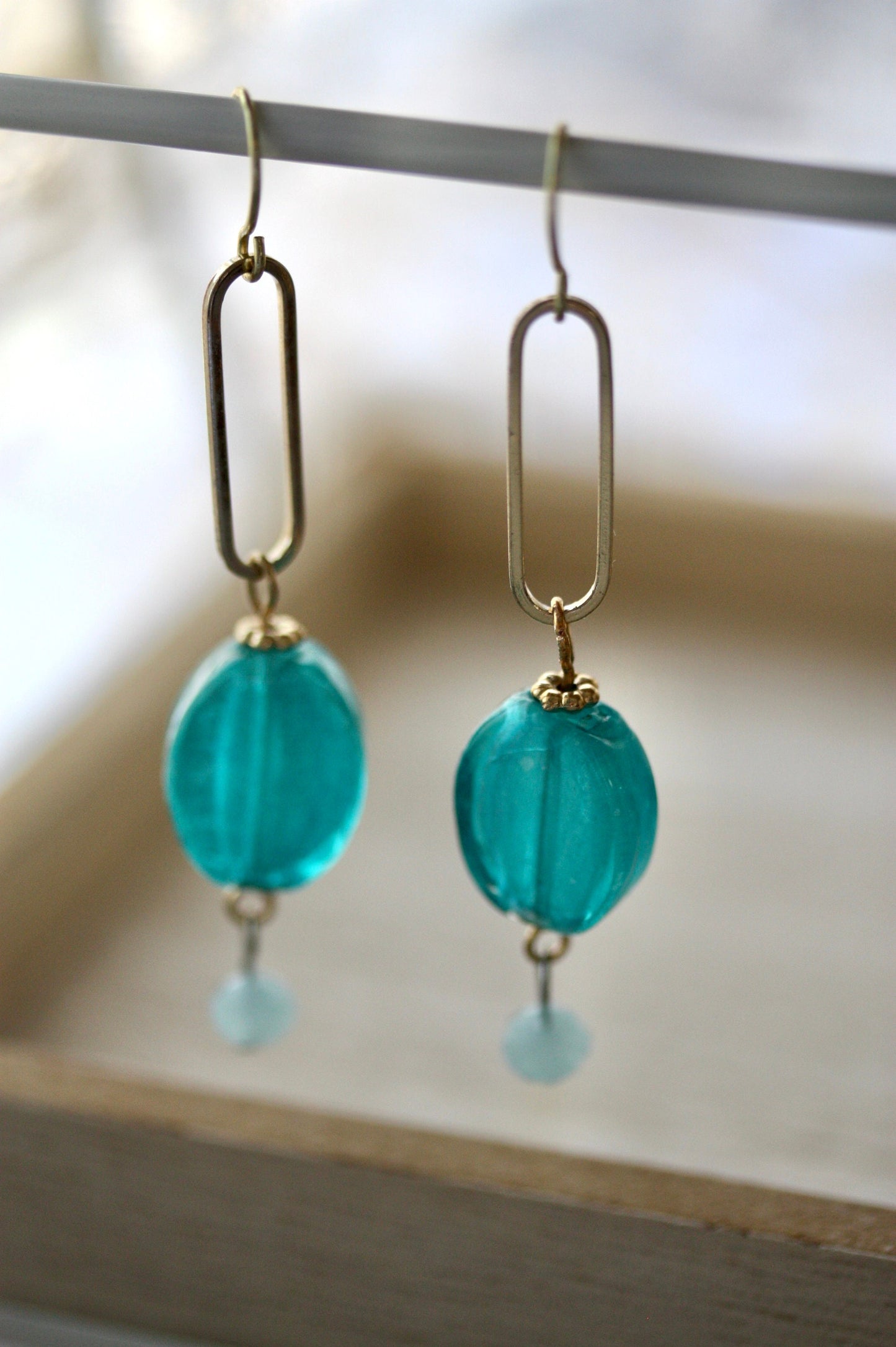 Turquoise glass and gold metal drop earrings