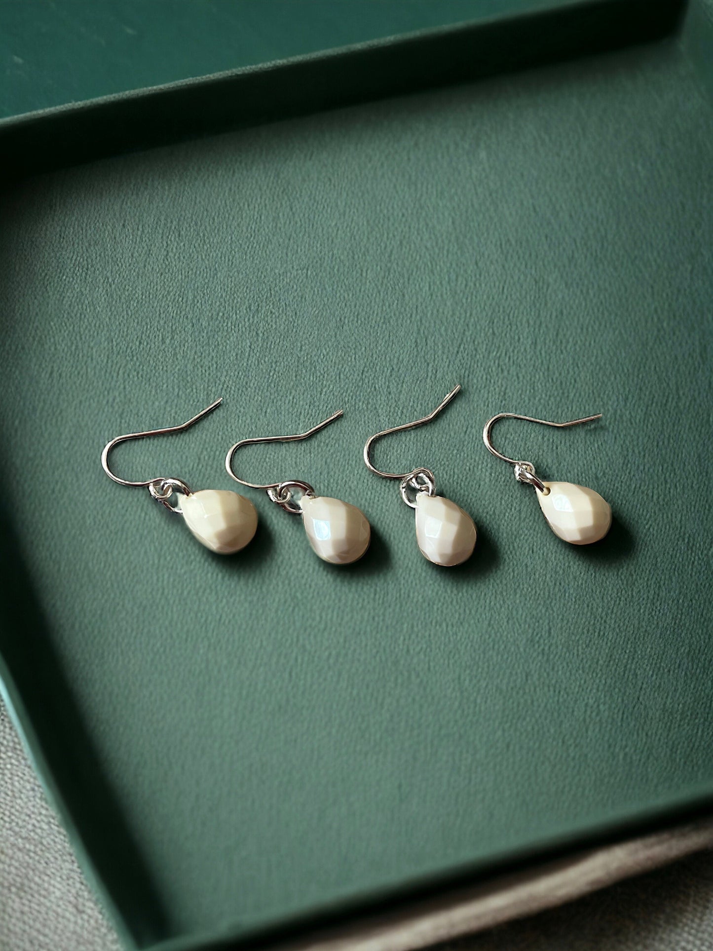 Small little "cream puff" simple easy to wear, go-with-everything dangle earrings