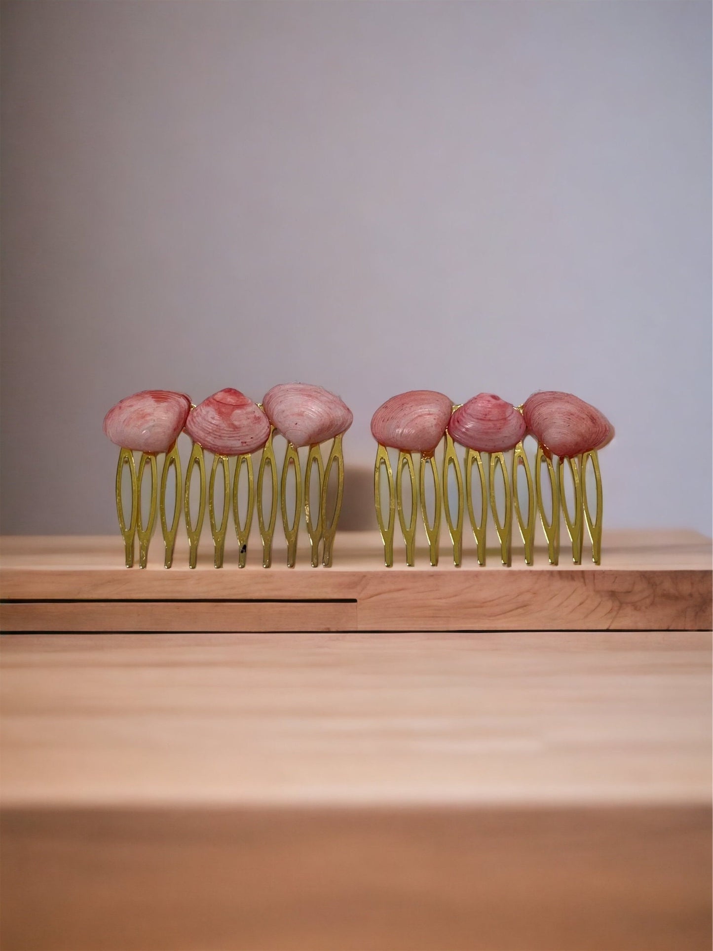 Pair of peach shell metal hair combs - 2" each