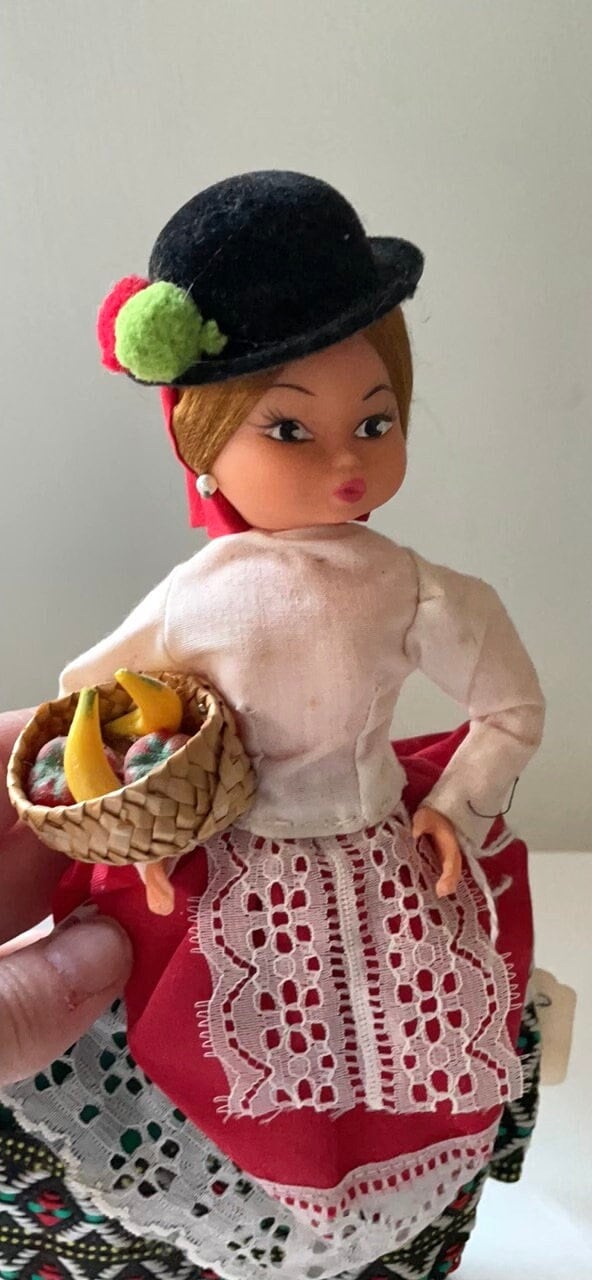 Vintage signed Muneca Artesana Beibi doll figurine - Made in Spain - holding wicker basket with miniature fruit