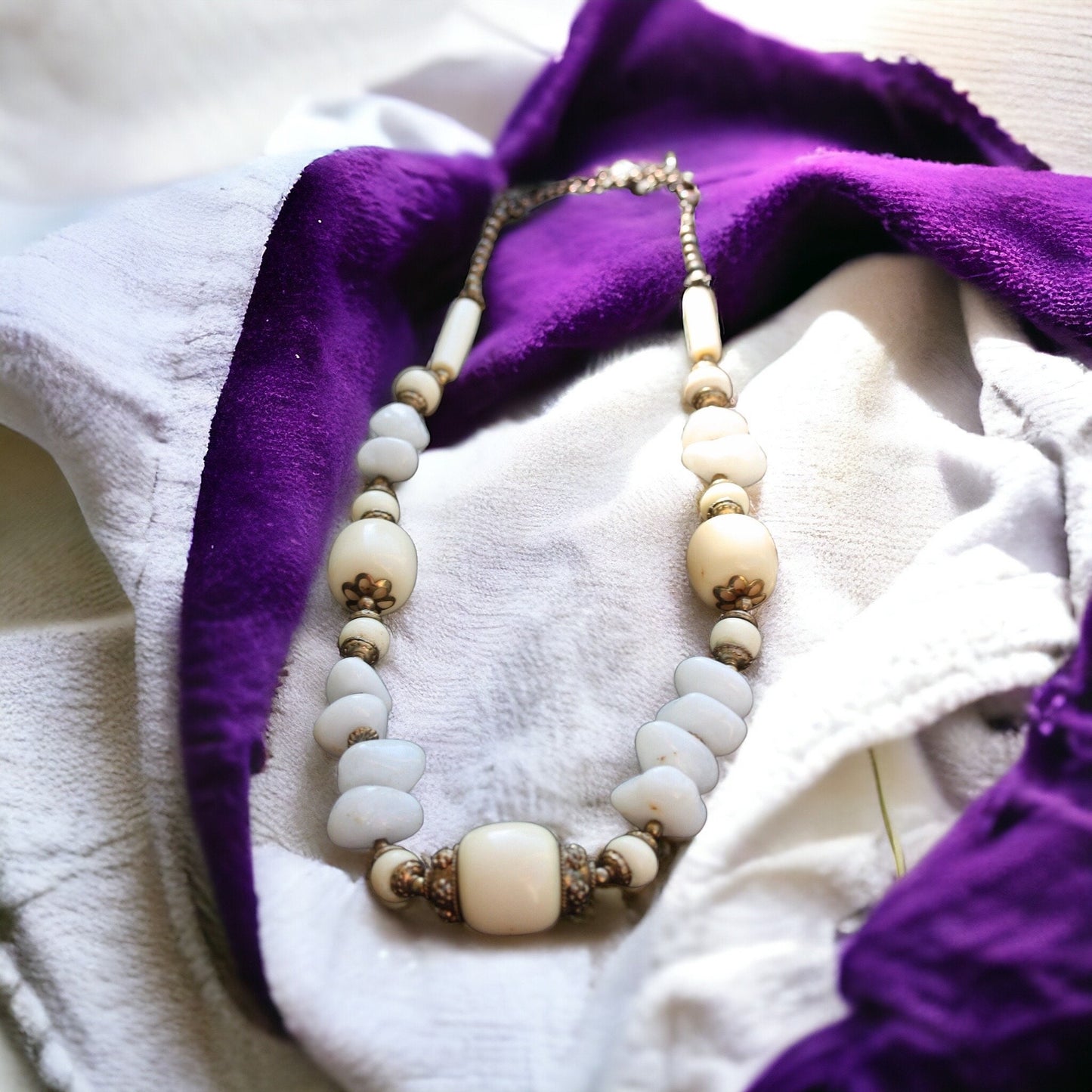 Unique vintage necklace - drilled stones, metal spacers and horn style varied shaped beads
