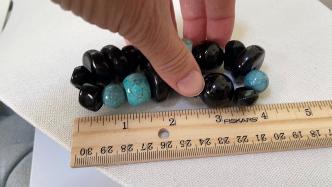Stunning vintage mixed sizes and shapes of black and faux turquoise beaded bracelet